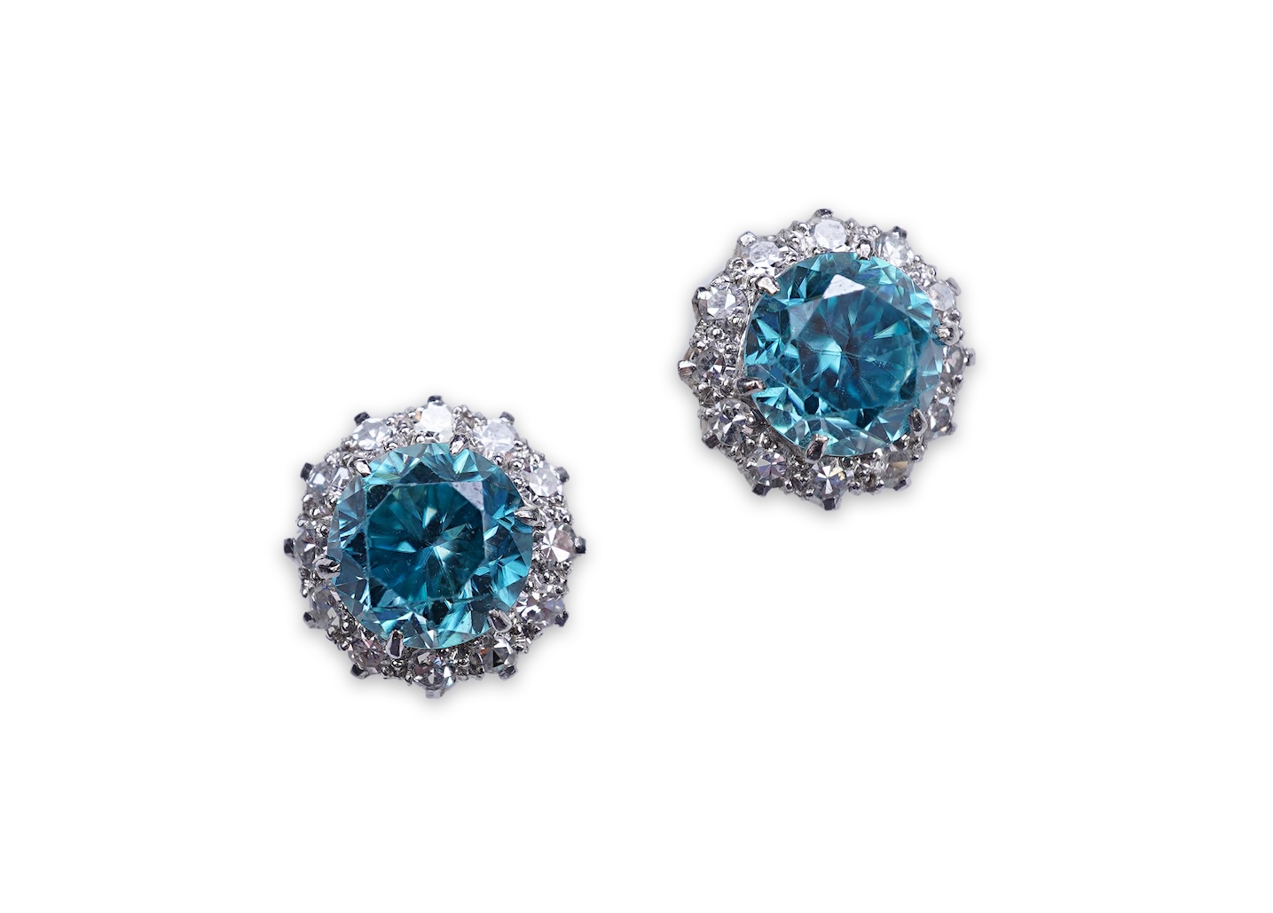 A pair of zircon and diamond earrings, mid 20th century